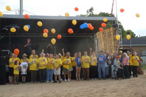 Cancer survivors at the 2014 North and Central Frontenac Relay for Life release balloons at the Parham Fairgrounds on June 20